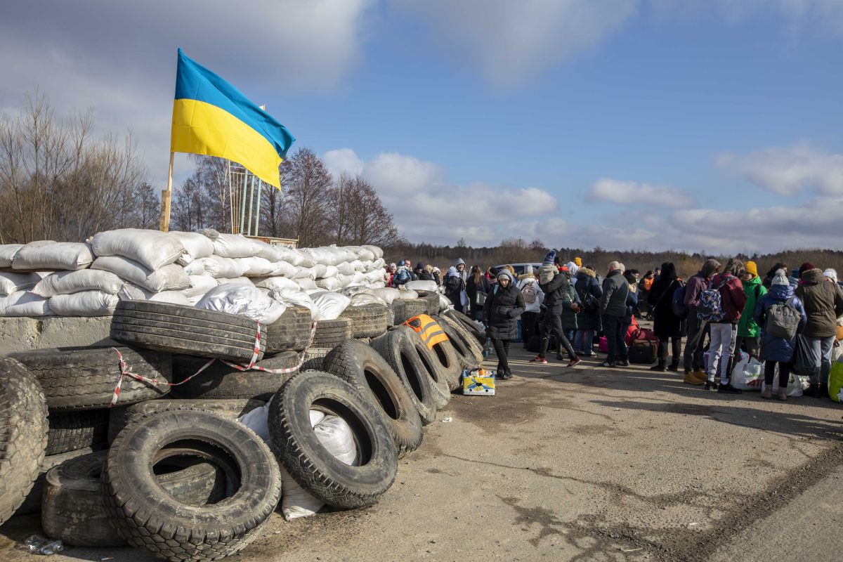 UKRAINIAN COUNTRYSIDE IN NORTH LWIV CHECKPOINT FOR THE ARRIVAL OF BUSES FOR CIVILIANS RUNNING TO...