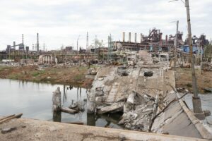 DONETSK REGION, UKRAINE - MAY 22, 2022: A distant view of the Azovstal Iron and Steel Works in...