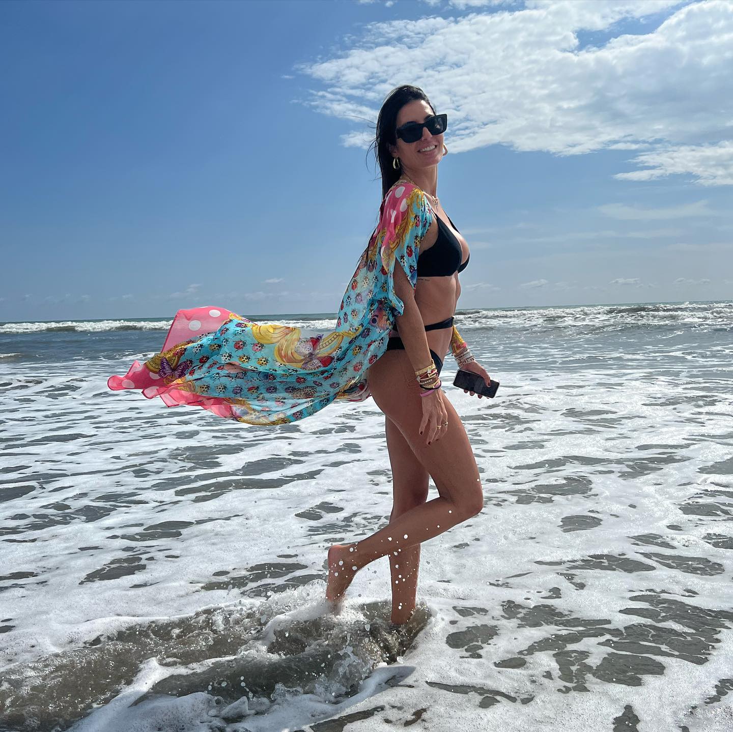 Elisabetta Gregoraci • Waves and my favourite person : the perfect combination...