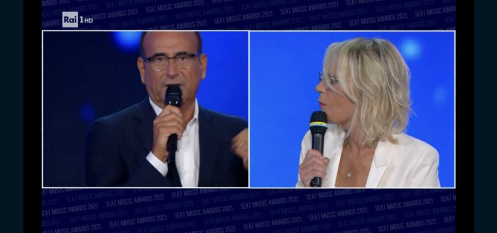 Maria De Filippi chiama in diretta a Tale e Quale Show e sorprende Conti: “Ci troviamo sul 5” – Il gesto inaspettato alla Rai