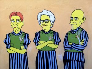 Raid antisemita a murale dei sopravvissuti ad Auschwitz a Milano