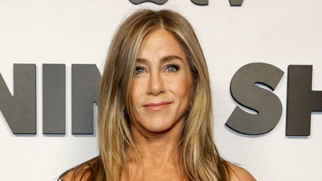 Jennifer Aniston’s secret to effortless elegance: the ultimate must-have for any event.