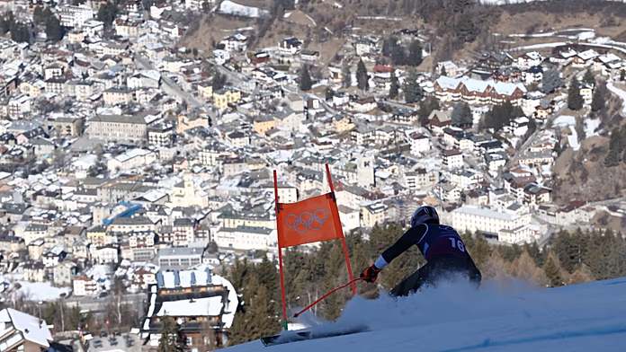 Cortina senza guanti: caldo e crisi climatica minacciano i Giochi invernali.