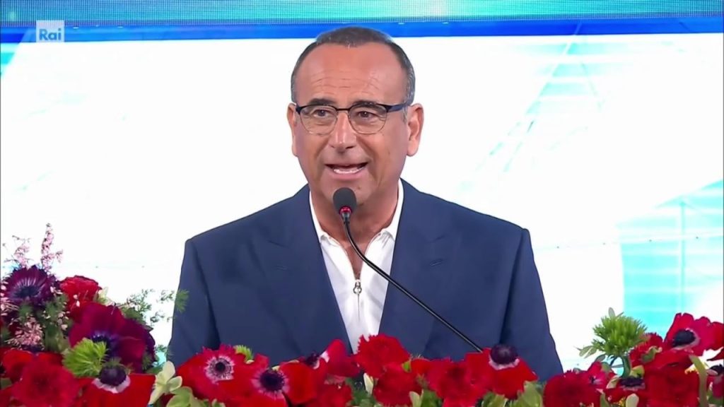 Tensioni in diretta: Carlo Conti risponde alle provocazioni di una giornalista con decisione.