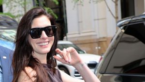 Anne Hathaway supports these eye-catching adidas trainers—style that makes a statement!