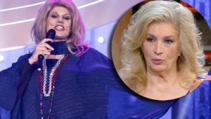 Iva Zanicchi imitata: la cantante non mostra entusiasmo dopo la performance