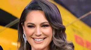 Kelly Brook effortlessly styles jelly flats with chic boho dress for a stunning look