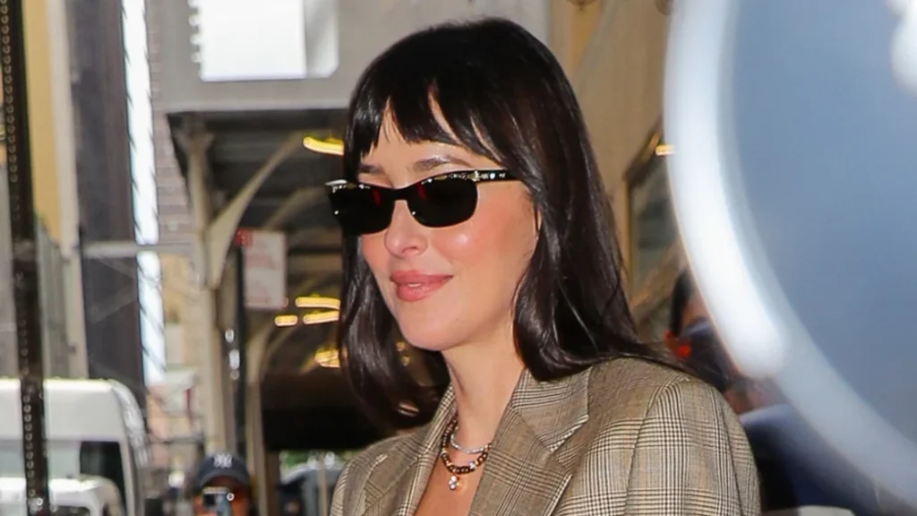Dakota Johnson showcases trendy ballet flats as fall must-have shoes with jeans and blazers