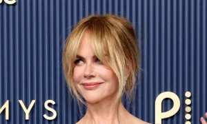 Nicole Kidman stuns in white feathered Emmys dress, a romantic masterclass in fashion.