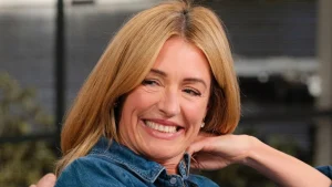 Cat Deeley elevates denim shirts with autumn leather skirt for a stylish look.