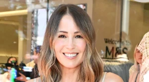 Rachel Stevens elevates M&S barrel-leg jeans and white shirt with luxurious accessories.