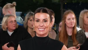 Coleen Rooney’s timeless LBD shines among stars at tonight’s NTAs.