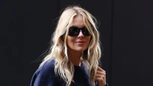 Sienna Miller endorses long shorts and knee-high boots as top autumn trend.