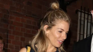 Sienna Miller showcases white trainers as must-have timeless autumn footwear trend
