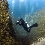 Intervista al fotografo Sirachai Arunrugstichai: svelando la bellezza del mare in Thailandia.